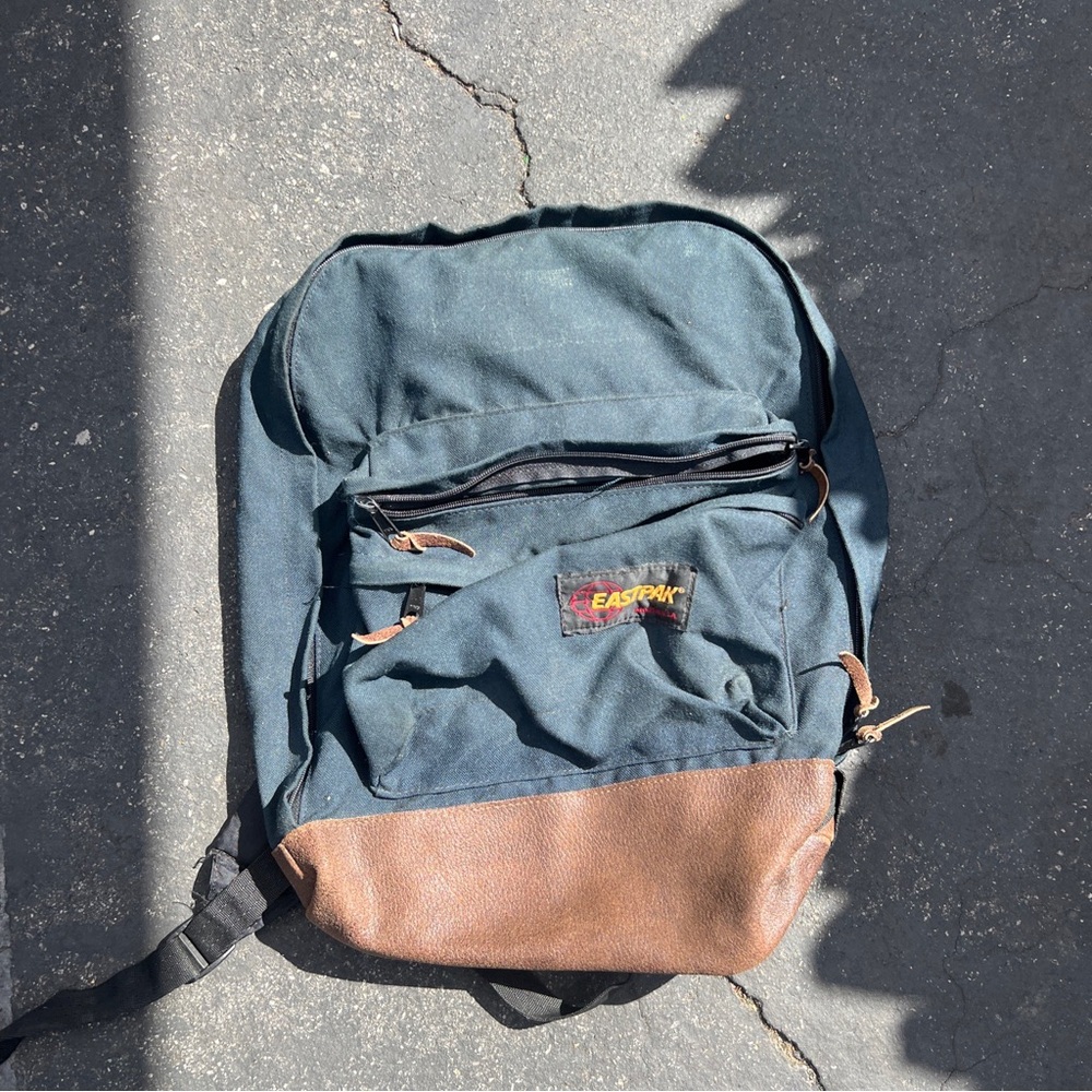 Eastpak Men’s Navy Backpack with Brown Leather Base made in USA